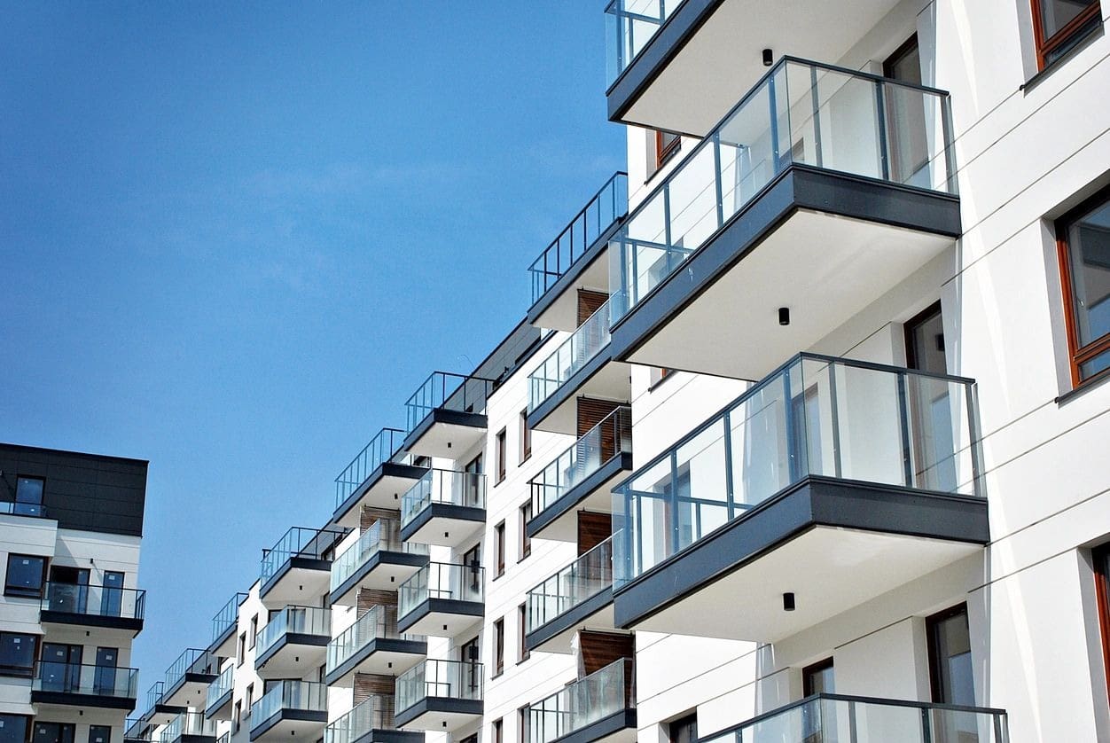 A row of balconies on the side of a building.